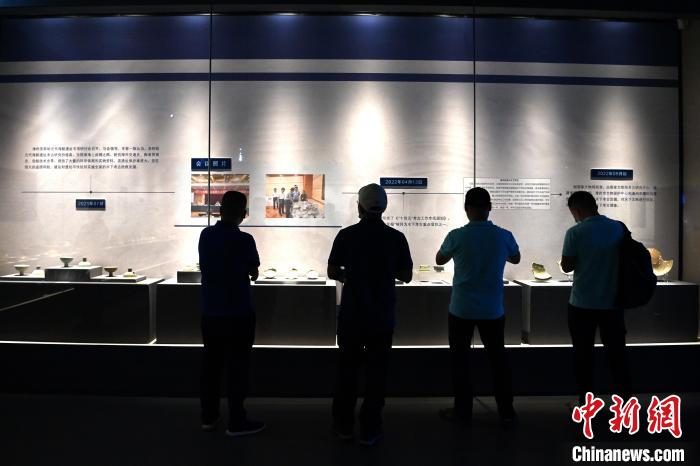 活动当天,不少民众慕名前来一睹沉睡700年文化遗产的神秘面纱。 张金川 摄 活动当天,不少民众慕名前来一睹沉睡700年文化遗产的神秘面纱。 张金川 摄